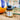 KI-generierte Abbildung (beispielhaft): Yes Vegan Vegan Kids Dose im Sand neben Volleyball